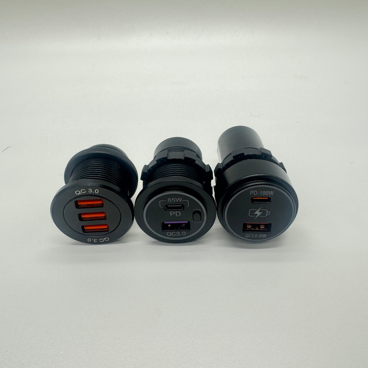 Front view of the triple USB-A, 65W USB-C PD and 100W USB-C PD chargers
