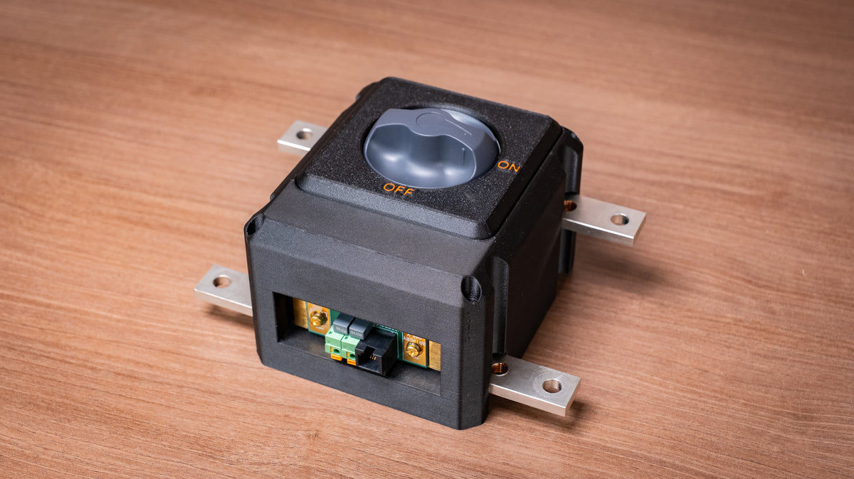 Falcon isolator and monitor module showing the rotary switch, front connectors and mounting tabs