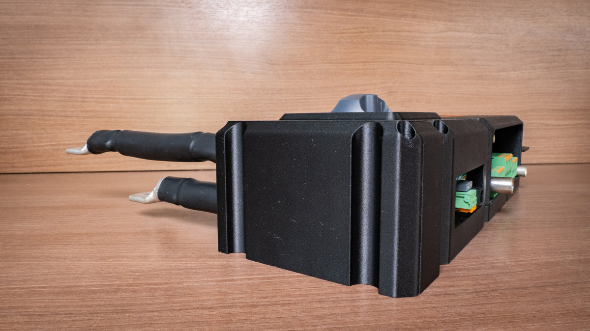 Side view of the Falcon isolator and monitor module with its cable cover fitted