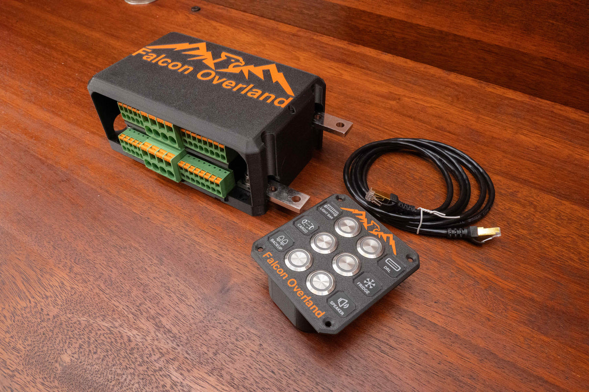 Falcon switching and distribution hub with cover fitted, six-button control panel and coiled cable