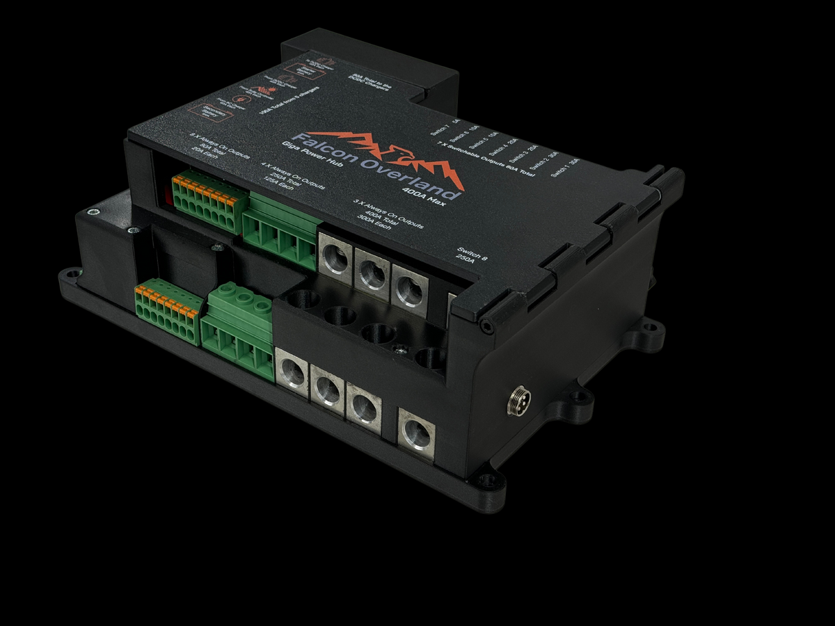 Giga Power Hub 12V power distribution system viewed from the front right, showing terminal blocks and hinged side panel