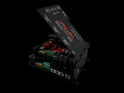 Giga Power Hub 12V power distribution system with cover raised, viewed from the right to show circuit board and terminal openings