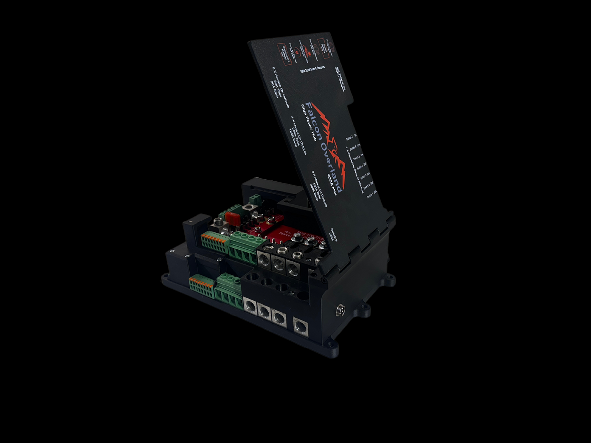 Giga Power Hub 12V power distribution system with hinged cover open, exposing circuit board and terminals